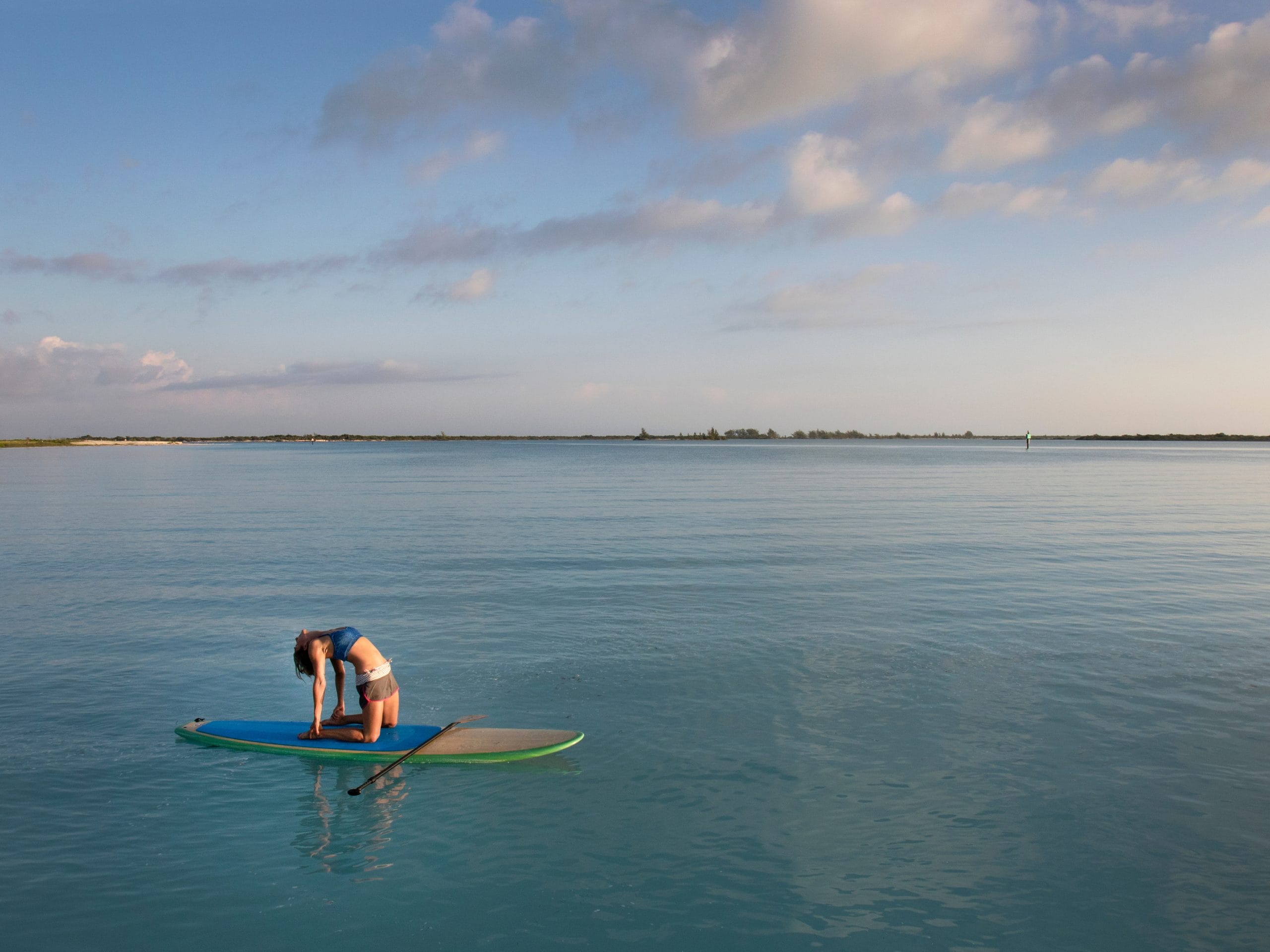 Paddle yoga sur l'eau